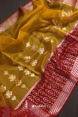 Mustard Yellow Banarasi Organza Saree Meenakari Border Zari Floral Buttas