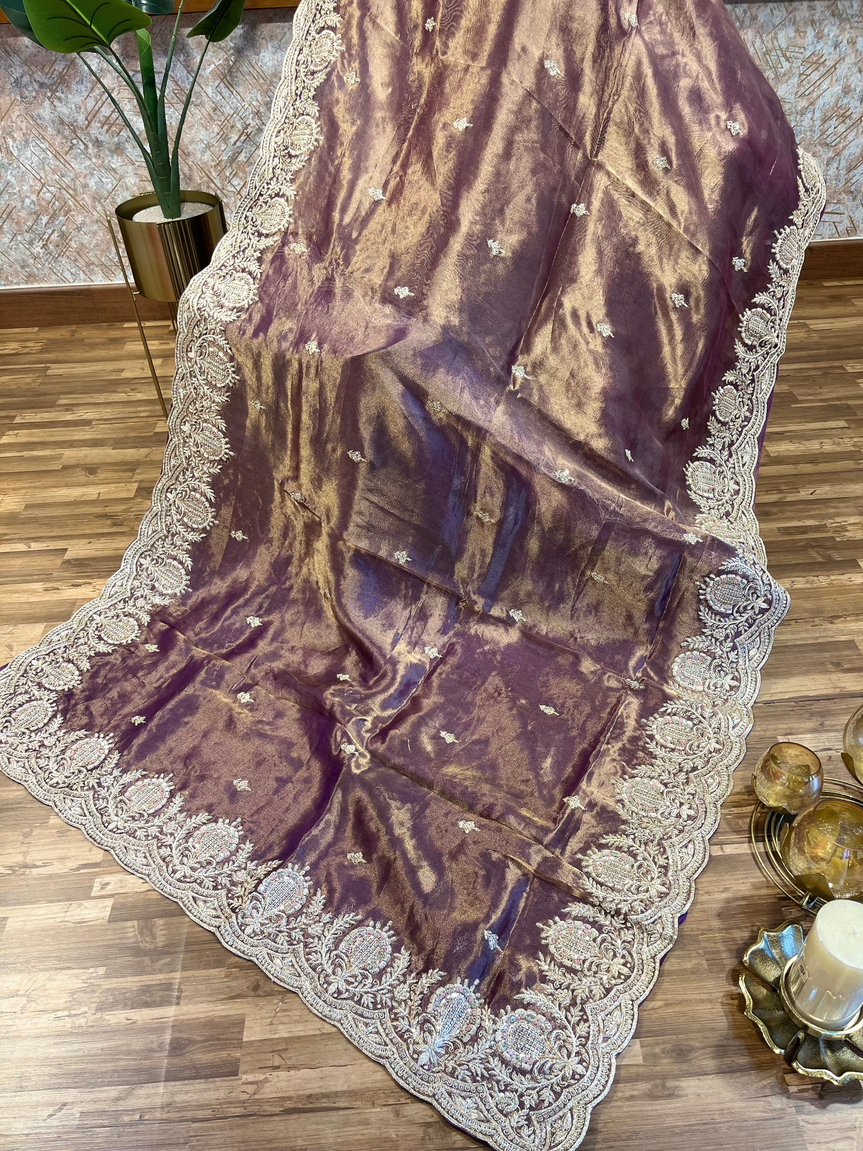 Tissue organza silk saree with heavy work borders and blouse
