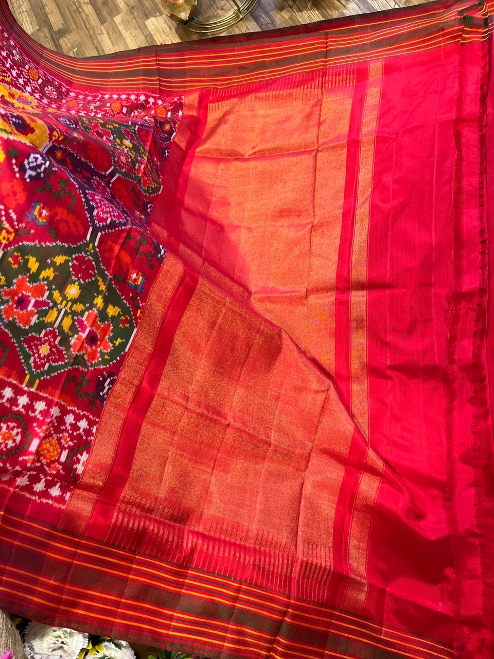 Reddish pink pan leaf design Twill ikkat