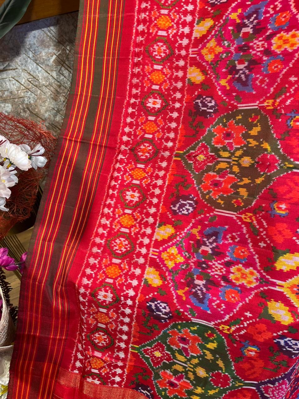 Reddish pink pan leaf design Twill ikkat