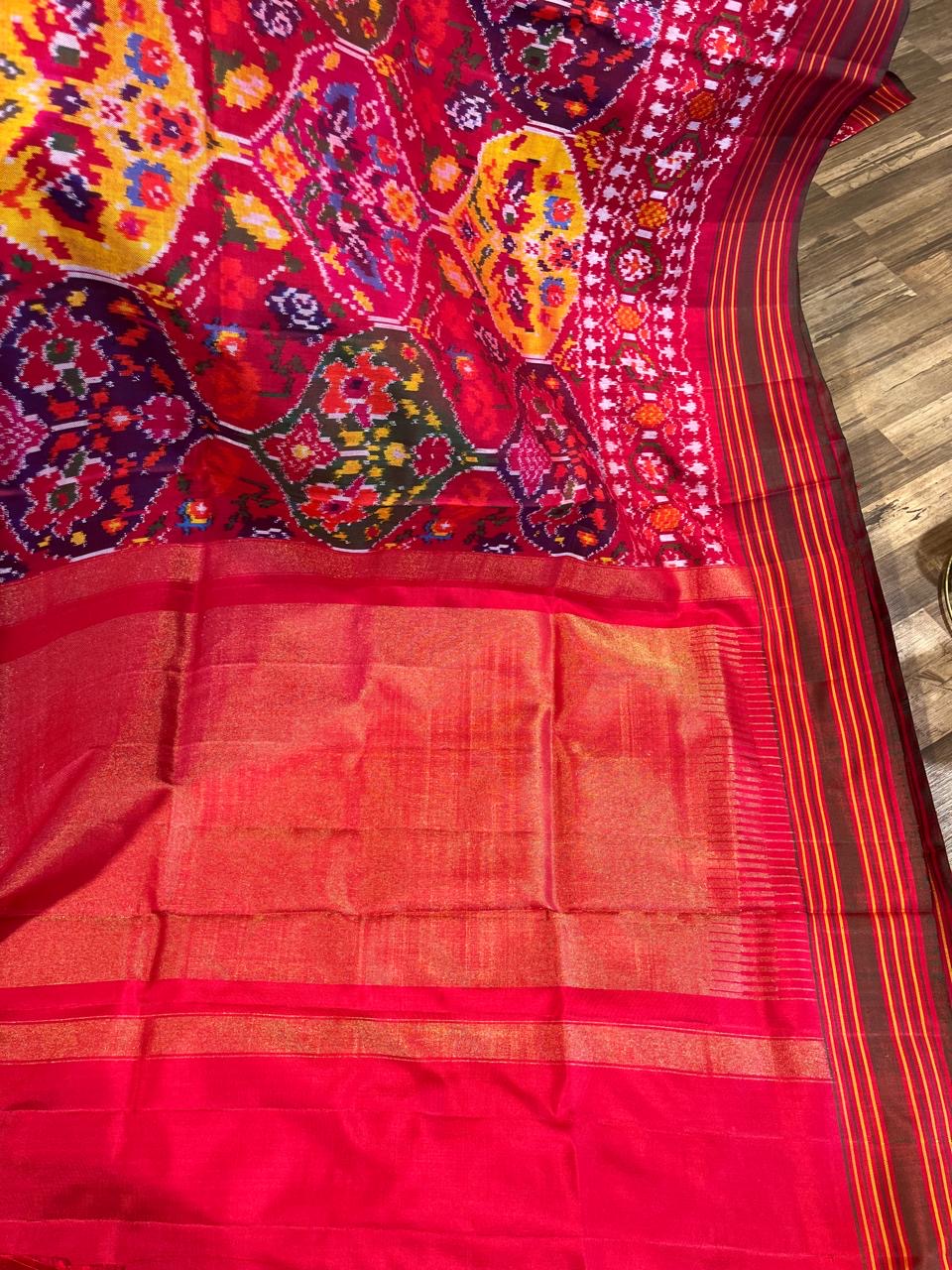 Reddish pink pan leaf design Twill ikkat