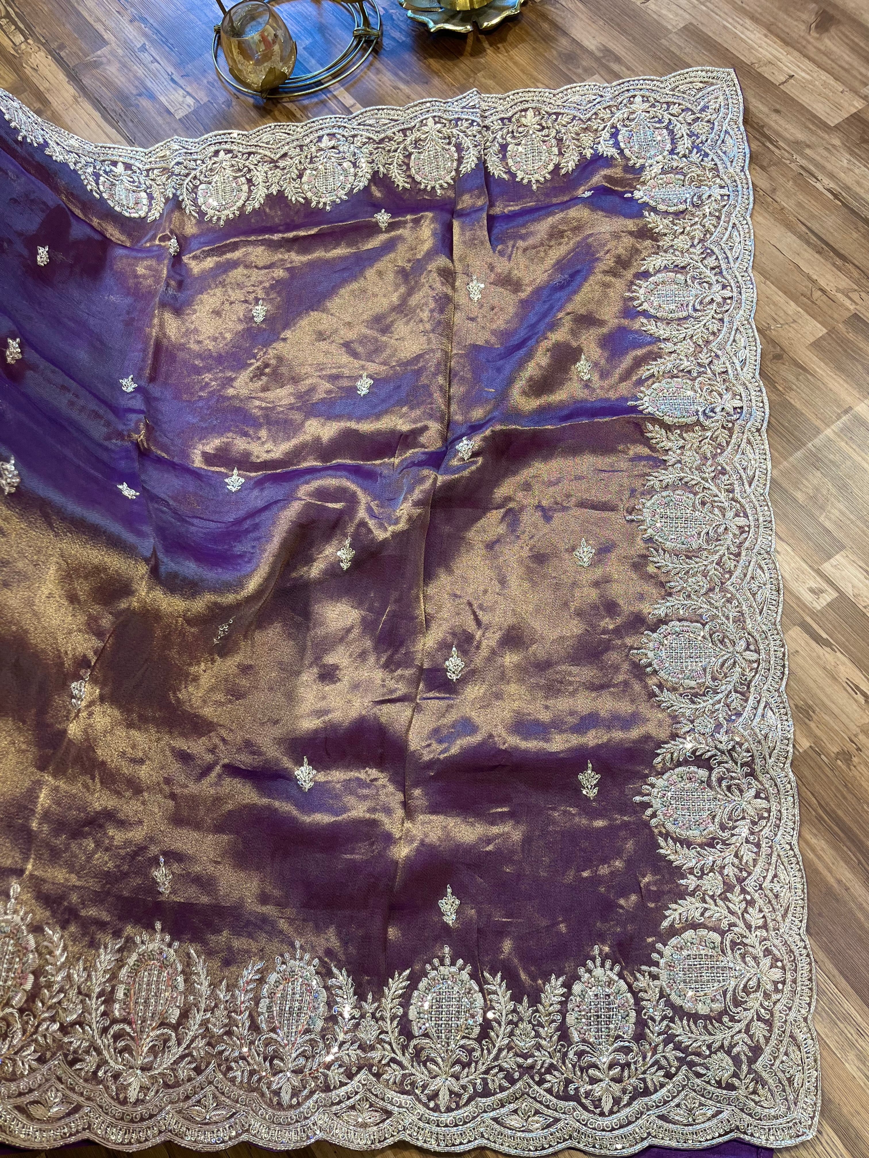 Tissue organza silk saree with heavy work borders and blouse