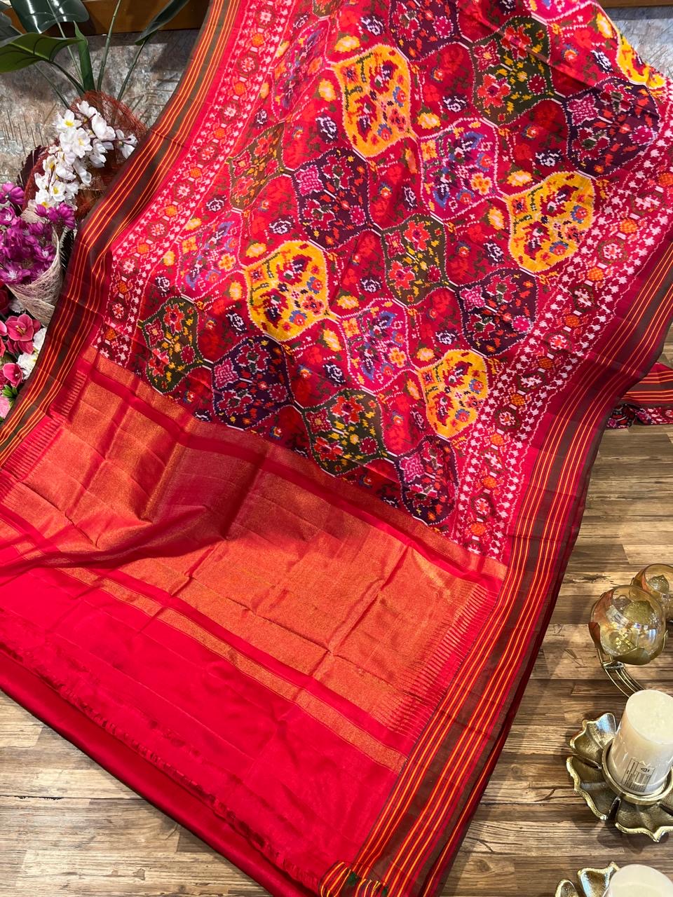 Reddish pink pan leaf design Twill ikkat