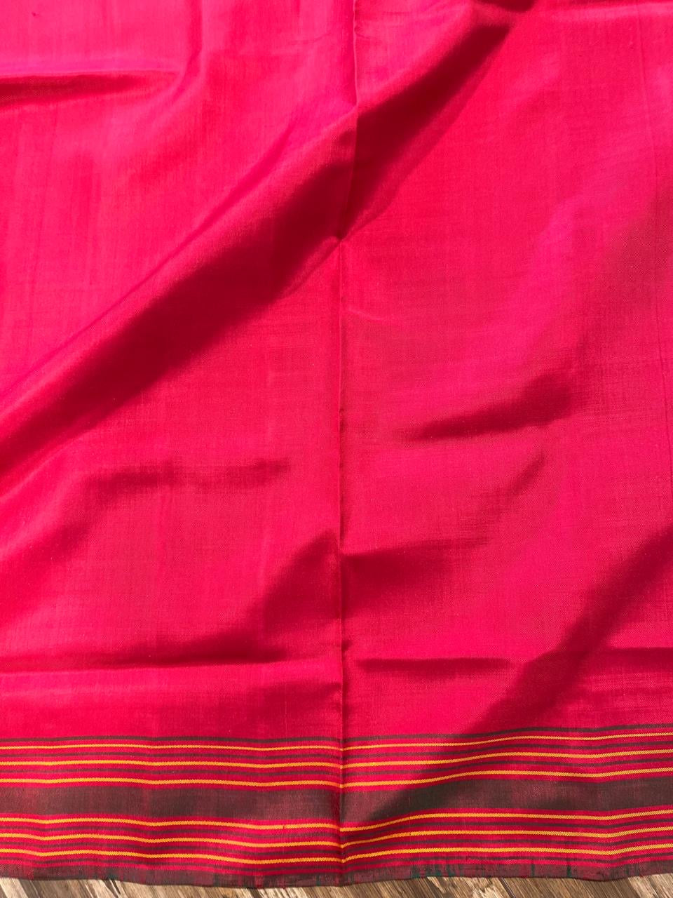 Reddish pink pan leaf design Twill ikkat