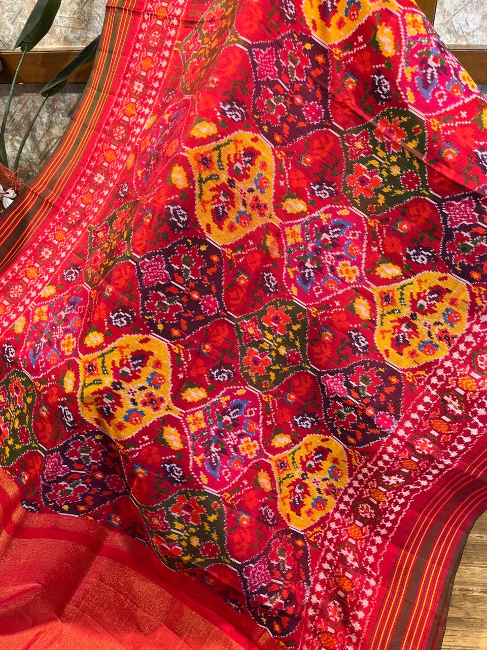 Reddish pink pan leaf design Twill ikkat