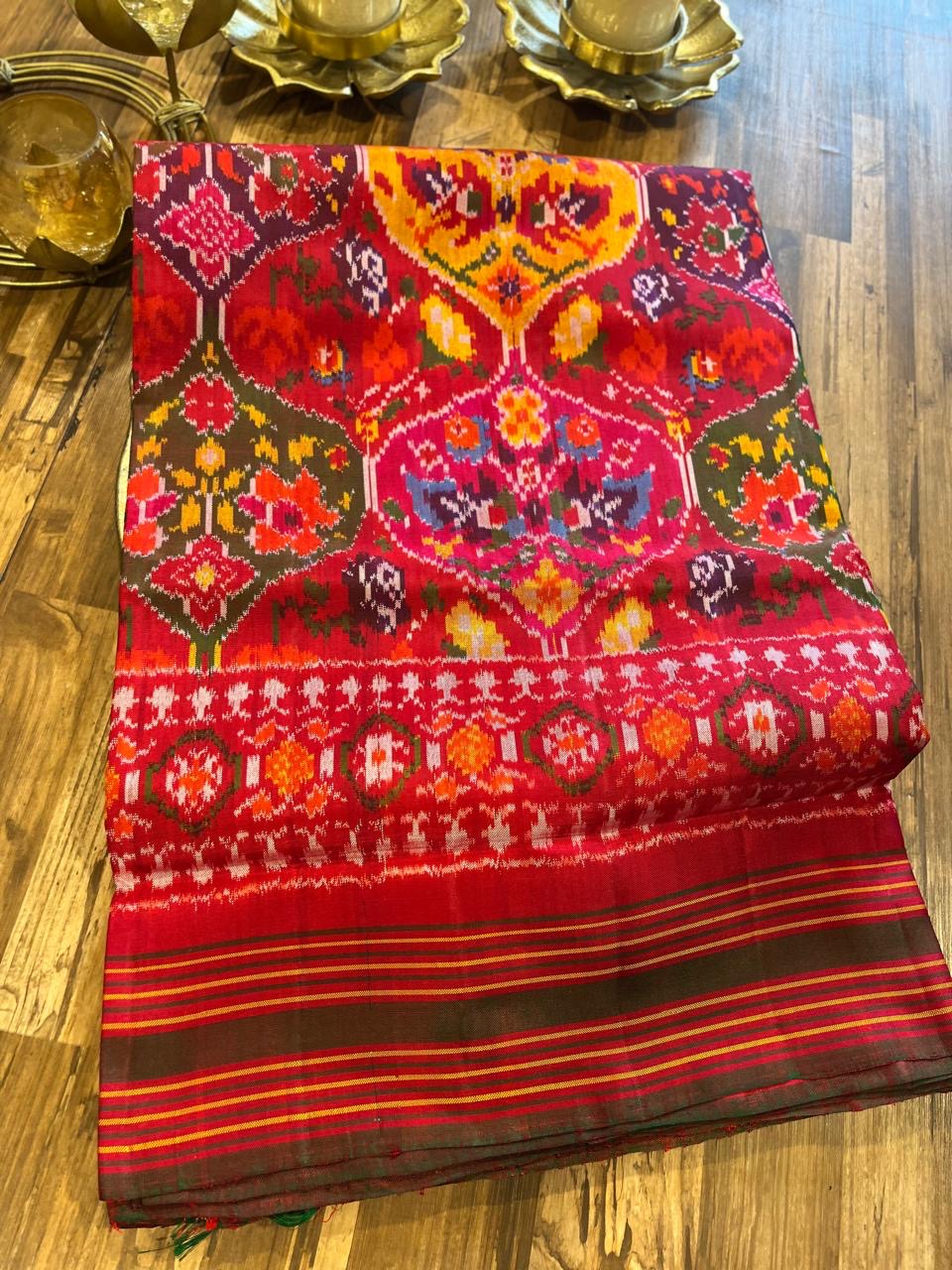 Reddish pink pan leaf design Twill ikkat