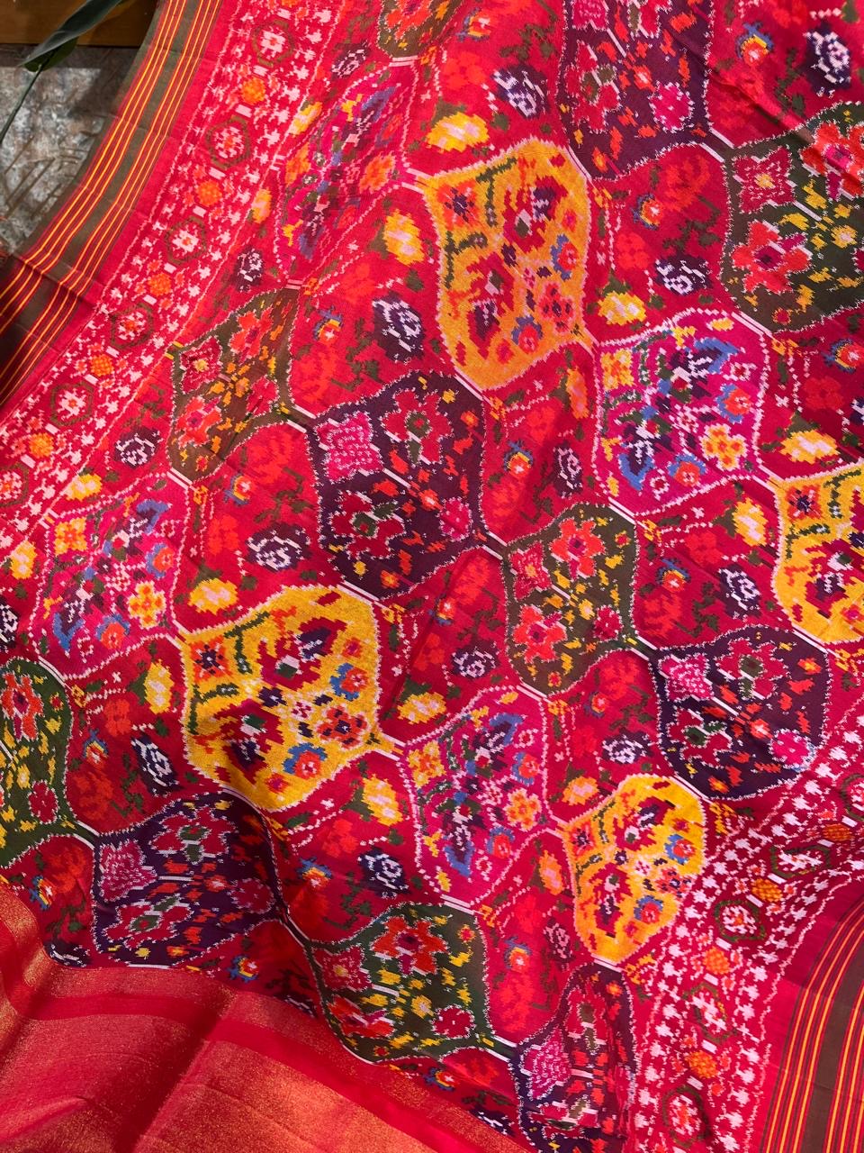 Reddish pink pan leaf design Twill ikkat